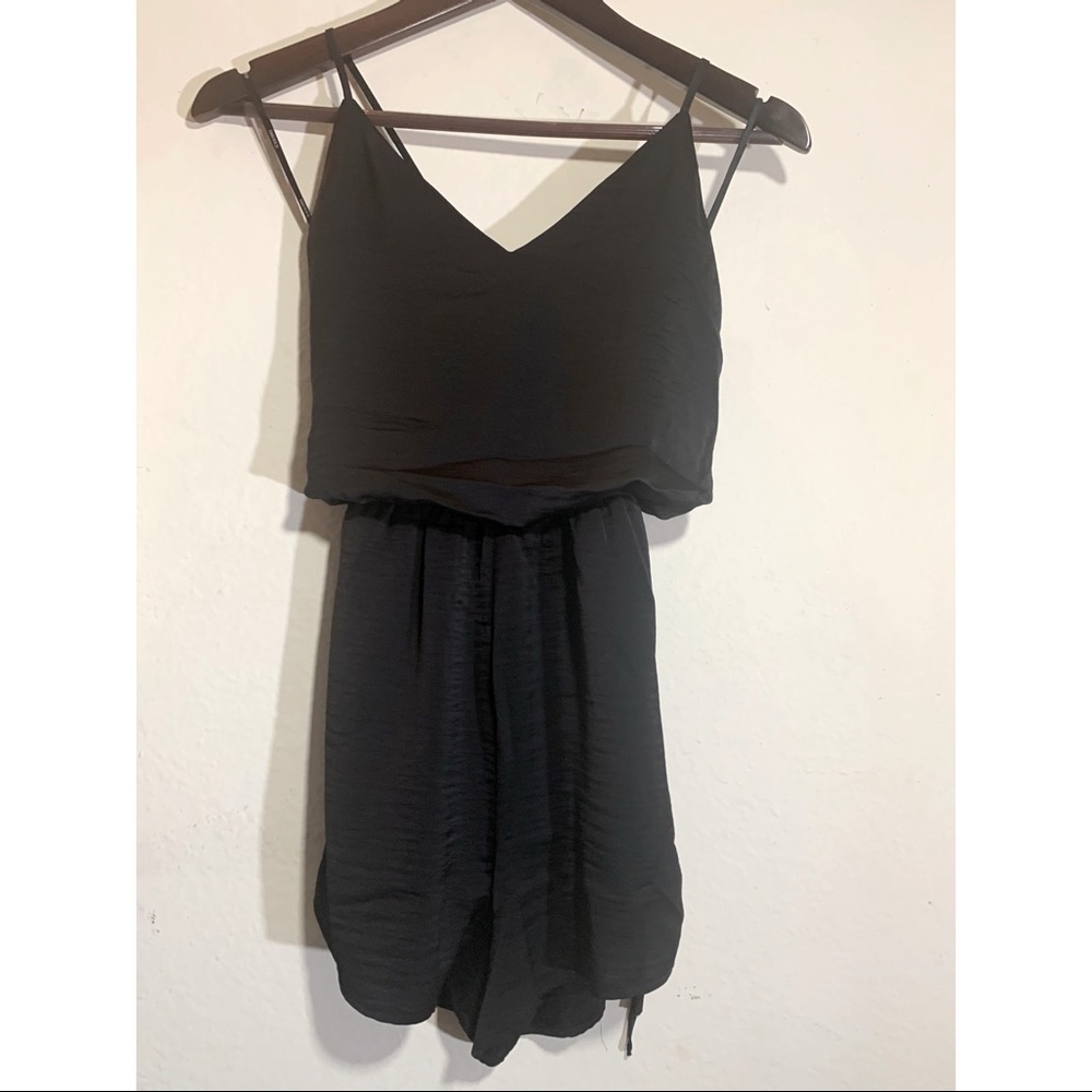 Black romper with open back size small